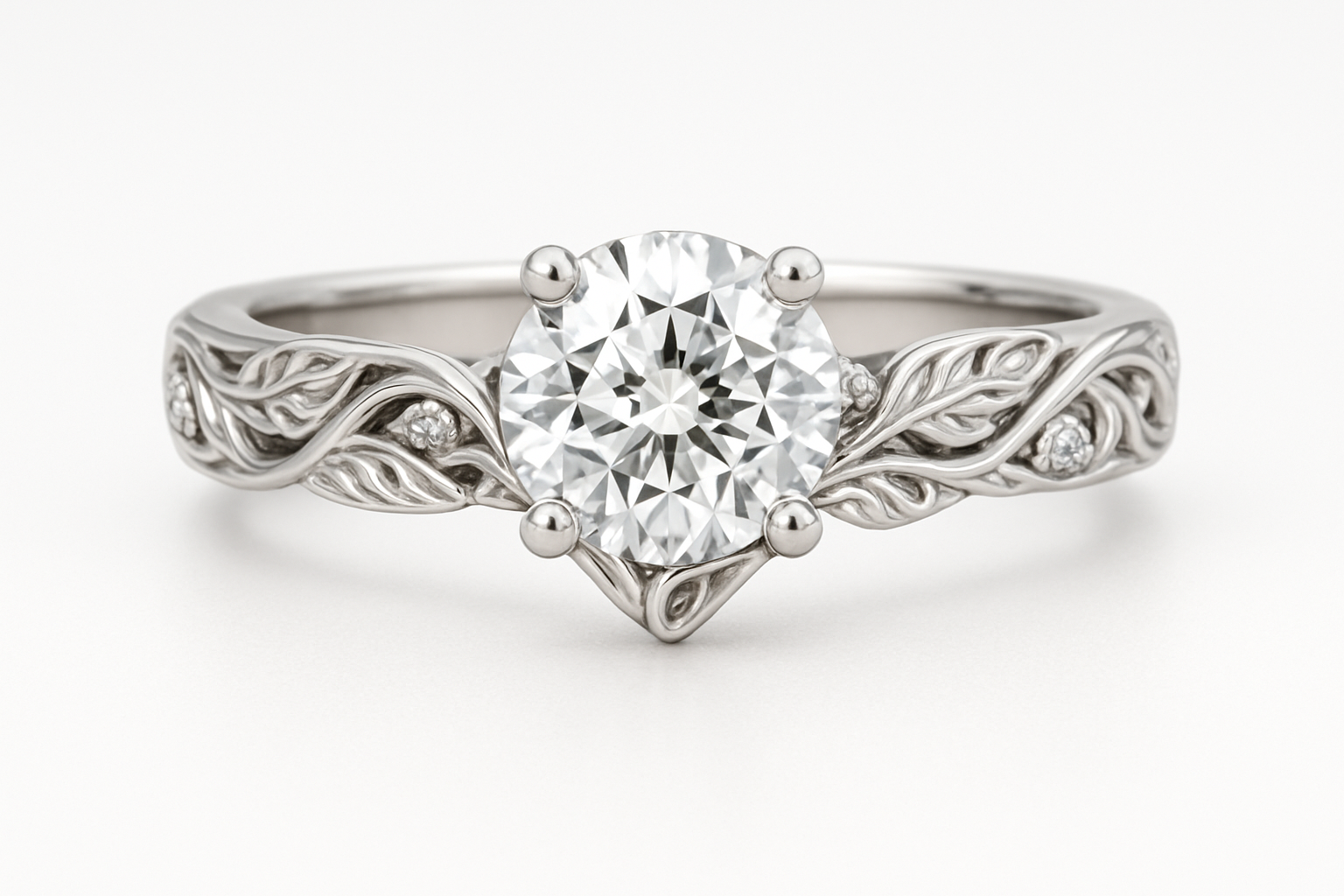 white gold nature insprired engagement ring with a round center diamond on a white background. be sure to make the center look straight ahead